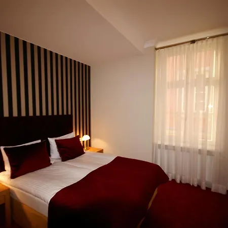 Hotell Kolegiacki 4*