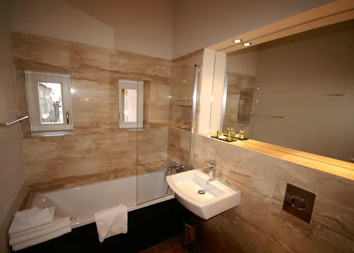 Hotell Kolegiacki 4*